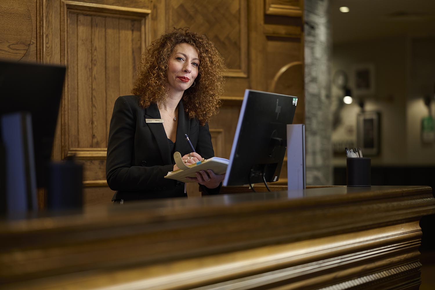 receptionist at the computer